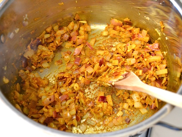 spices added to pot with onion mixture 