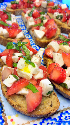 Strawberry Bruschetta, vegetarian and easy to put together with fresh strawberries, basil, olive oil and balsalmic vinegar, and fresh mozzarella cheese on good bread