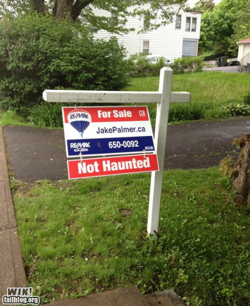 photo of a for sale sign that says...not haunted