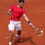 Spain's Rafael Nadal hits a return to Uzbekistan's Denis Istomin during their men's Singles 2nd Round tennis match of the French Open tennis tournament at the Roland Garros stadium, on May 31, 2012 in Paris.  AFP PHOTO / KENZO TRIBOUILLARD        (Photo credit should read KENZO TRIBOUILLARD/AFP/GettyImages)