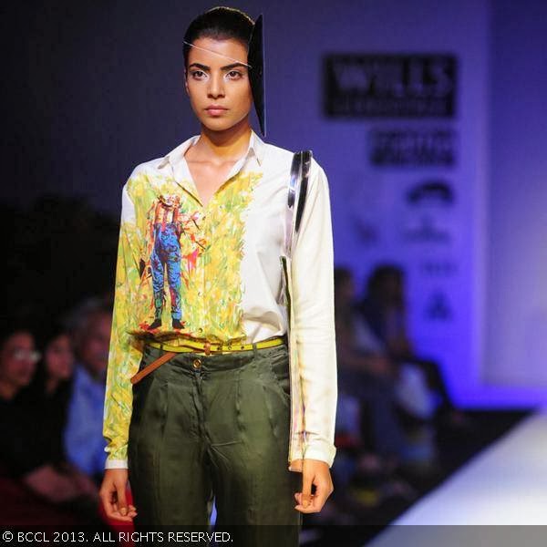 A model showcases a creation by fashion designer Nida Mahmood on Day 1 of the Wills Lifestyle India Fashion Week (WIFW) Spring/Summer 2014, held in Delhi.