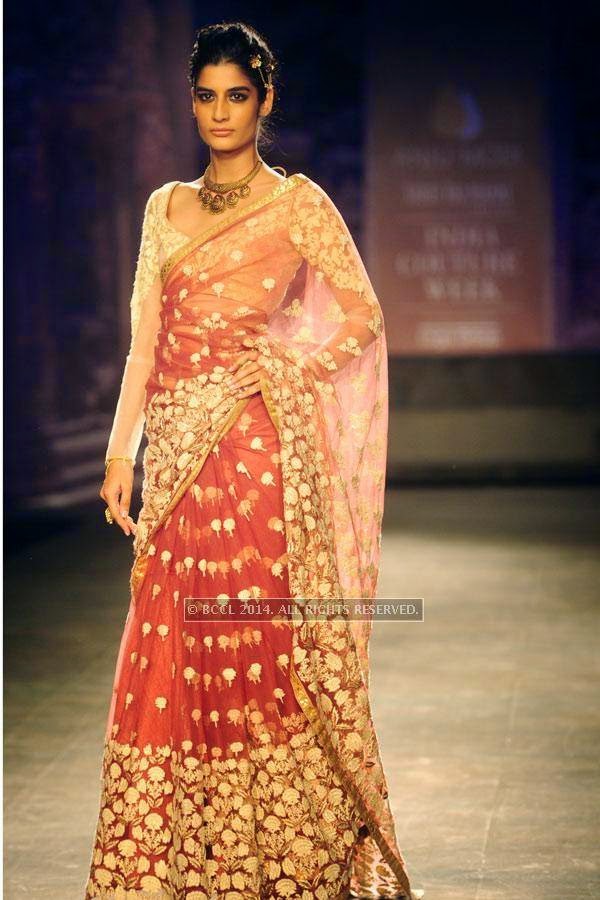 Erika walks the ramp for Anju Modi on Day 2 of India Couture Week, 2014, held at Taj Palace hotel, New Delhi.