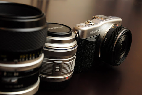 E-PM1 w/ Panasonic 14/2.5, 55/3.5 Micro Nikkor, and 14-42R MKII Kit lens