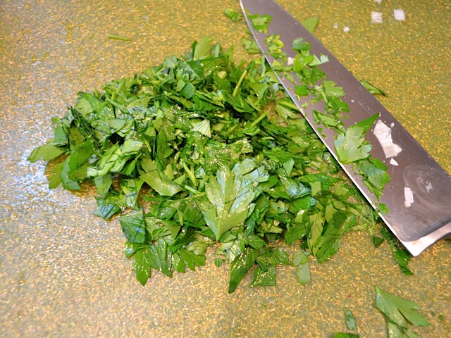 chopping parsley with knife 