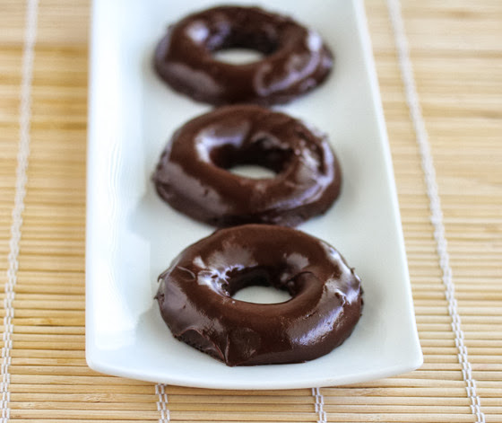 photo of donuts lined up on a plate