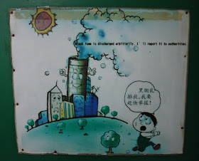 poster of kid running from polluting factory