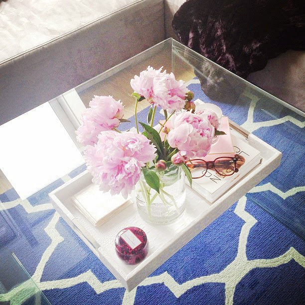 blue patterned rug, white tray + pink peonies
