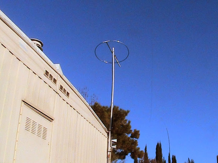The
                      homebrew 6 meter halo antenna was secured with a
                      U-bolt atop a 10 foot (3 m) length of 1" (2.5
                      cm) Schedule 40 PVC pipe and mounted on the roof
                      about 18 feet (6 m) above ground level for the
                      2014 ARRL VHF Sweepstakes contest.