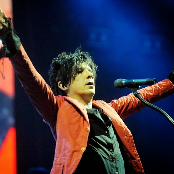 Nicola Sirkis, French singer of the pop band Indochine performs July 17, 2014 during the 23rd edition of the Festival des Vieilles Charrues in Carhaix-Plouguer, western of France.