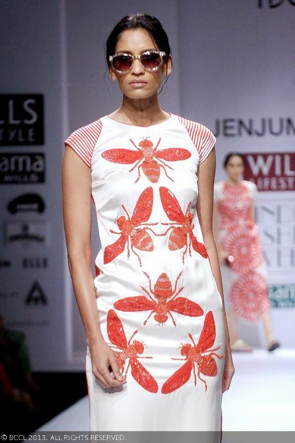 Krishna walks the ramp for fashion designer Jenjum Gadi on Day 3 of the Wills Lifestyle India Fashion Week (WIFW) Spring/Summer 2014, held in Delhi.
