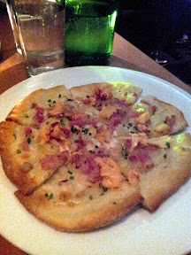 Gruner appetizer of tarte flambee bonne anee, alsatian pizza with sweet onions, maine lobster, smoky bacon, fromage blanc, Portland
