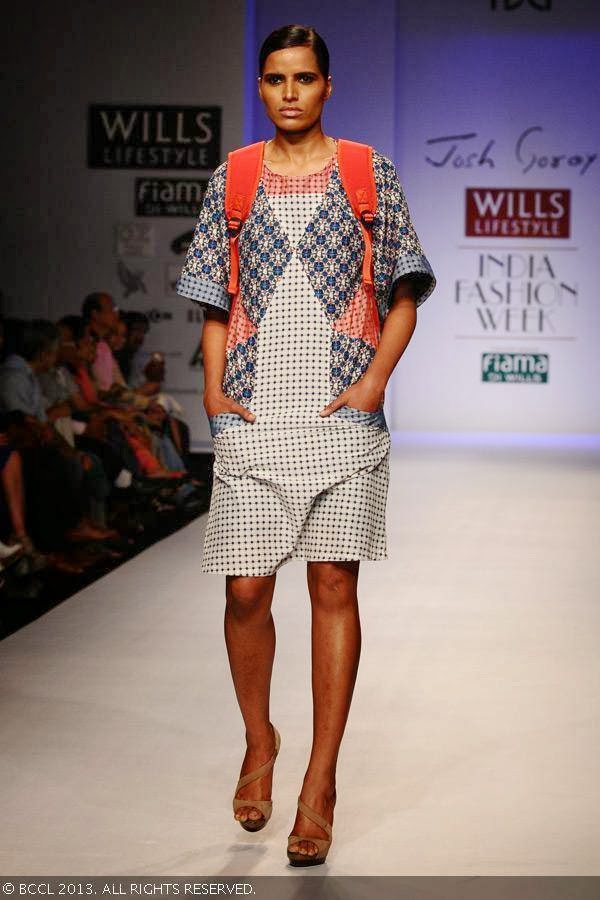 Preeti displays a creation by fashion designer Josh Goraya on Day 5 of Wills Lifestyle India Fashion Week (WIFW) Spring/Summer 2014, held in Delhi.<br /> 