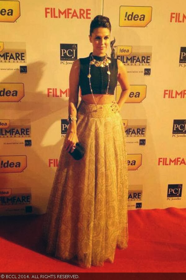 Neha Dhupia looks gorgeous as she walks the red carpet at the 59th Idea Filmfare Awards 2013, held at the Yash Raj Studios in Mumbai, on January 24, 2014.