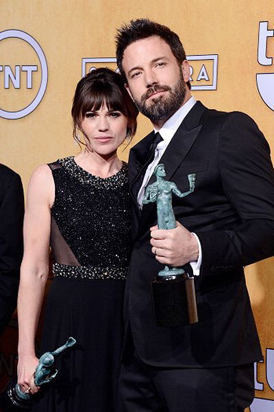 Actress Clea DuVall (L) and actor-director Ben Affleck won the award for Outstanding  Performance by a Cast in a Motion Picture for 'Argo' during the 19th Annual Screen Actors Guild Awards, held at The Shrine Auditorium in Los Angeles on January 27, 2013. (Getty Images)<br />  