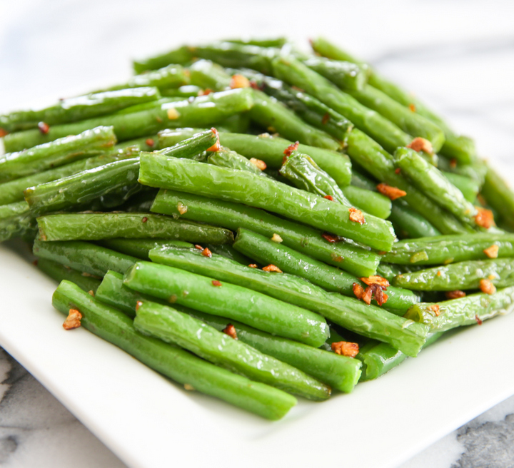 close-up photo of plate of garlic green beans
