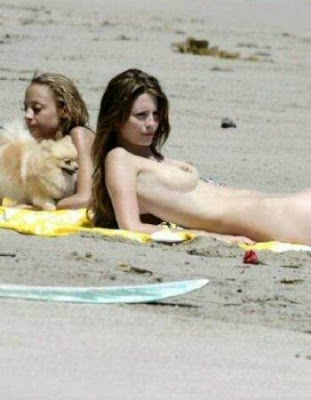 Misha Barton likes to go topless on the beach. 