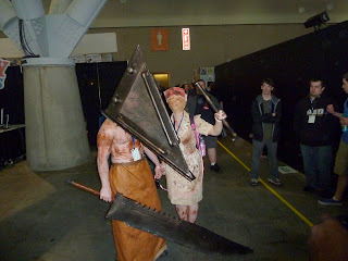 Umm... if we're in Silent Hill, I don't think I need any medical attention. Thanks, though, Nurse and Pyramid Head.