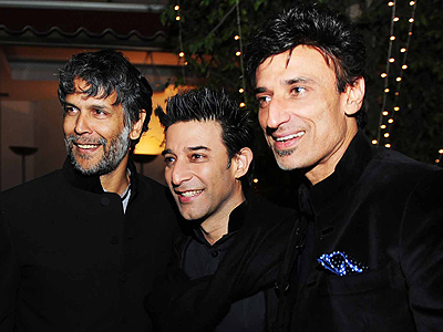 Suneet Varma with Milind Soman and Rahul Dev during the launch of his coffee table book at the French embassy in New Delhi. 