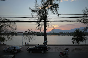 second story view of a river and mountains in Kampot, Cambodia