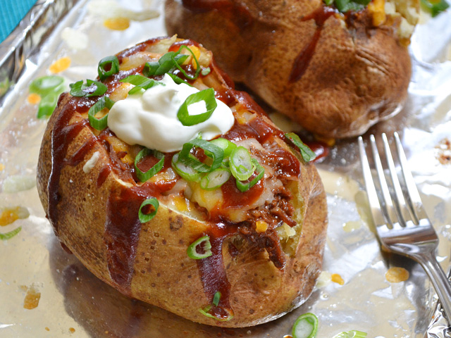 BBQ Beef Stuffed Potatoes with fork 