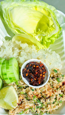 Laap Gai. This is a dish of minced chicken that you eat in lettuce wraps and can adorn with cucumber, a pinch of sticky rice, and a little scoop of jaew bawng (a dark thick reddish paste made from chiles and galangal root) from Haan Ghin, a Laotian Food Cart in Portland