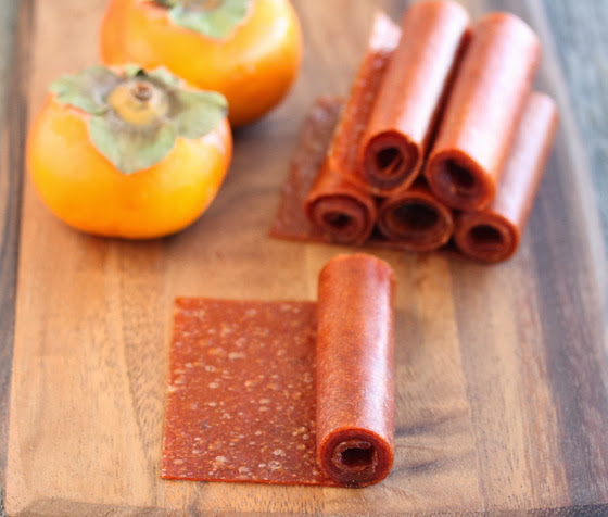 Persimmon Fruit Roll Ups on a cutting board