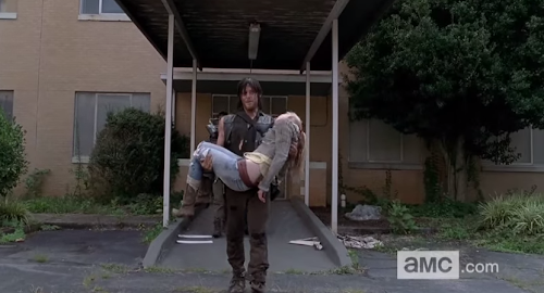 Daryl carrying Beth's body out of the hospital