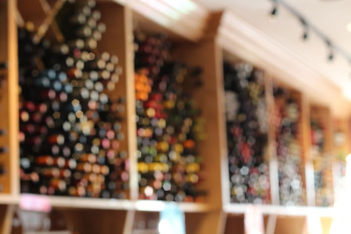 many colors of small out-of-focus things arranged in a hexagonal grid