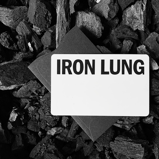 Iron Lung Barbershop logo