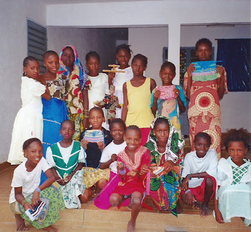 teaching Malian girls to crochet