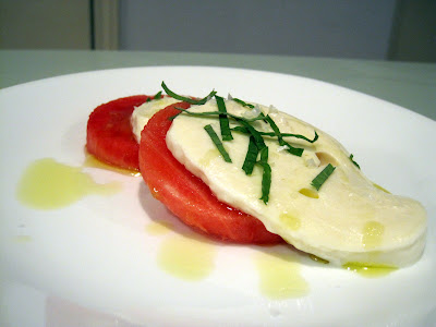Fresh mozzarella with watermelon, mint, olive oil and flaky salt.