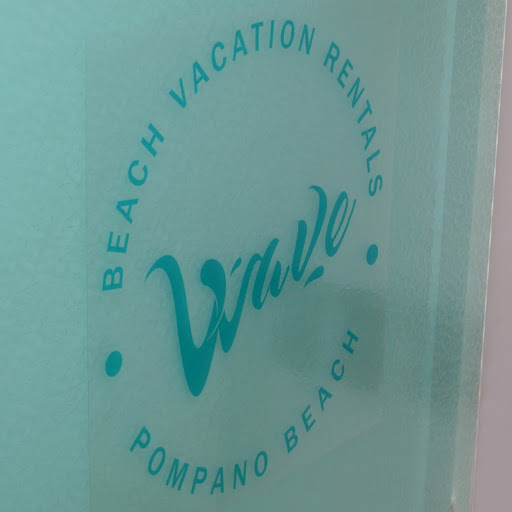 Wave Beach Vacation Rentals logo
