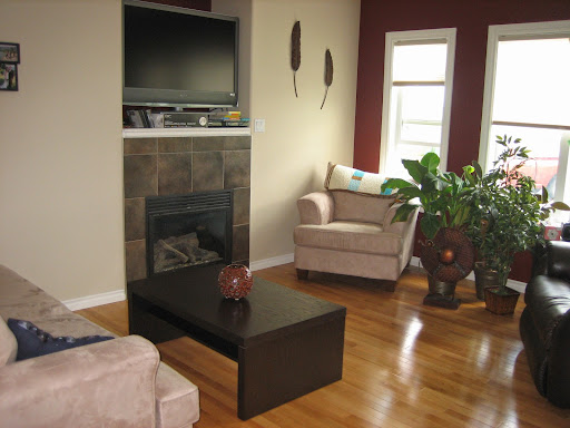 small living room with fireplace and tv