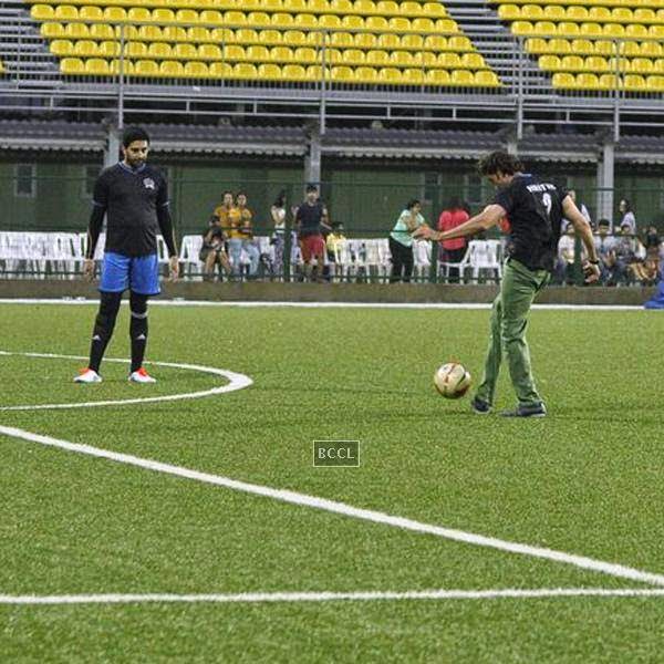 Abhishek Bachchan and Hrithik Roshan in action during a charity soccer match organised by Aamir's daughter Ira Khan, at Cooperage ground, on July 20, 2014.(Pic: Viral Bhayani)