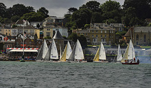 J/80 sailboats- starting off Royal Yacht Squadron, Cowes, Isle of Wight, England