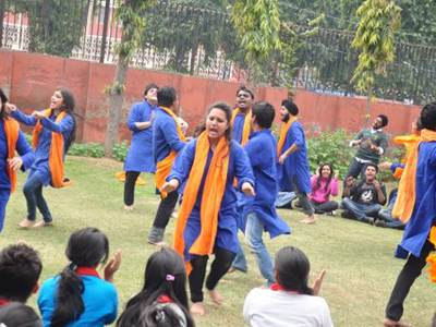 Participants in action during a street play competition at FMS, Delhi.