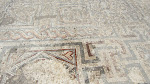 Remaining mosaic tiles on the ground