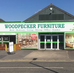 Woodpecker Furniture logo