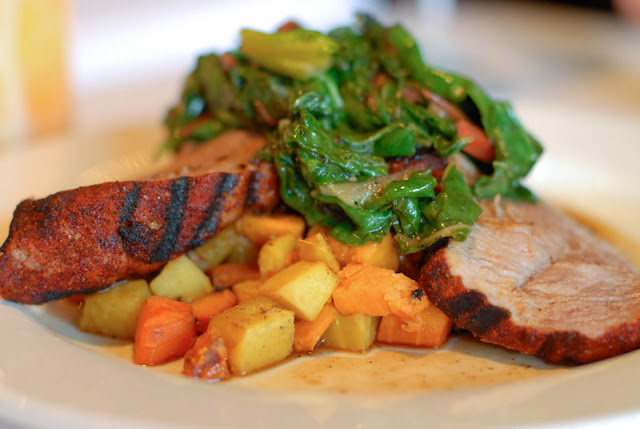 A close up of a plate of food with meat and vegetables, with La Casa Sena and Local food