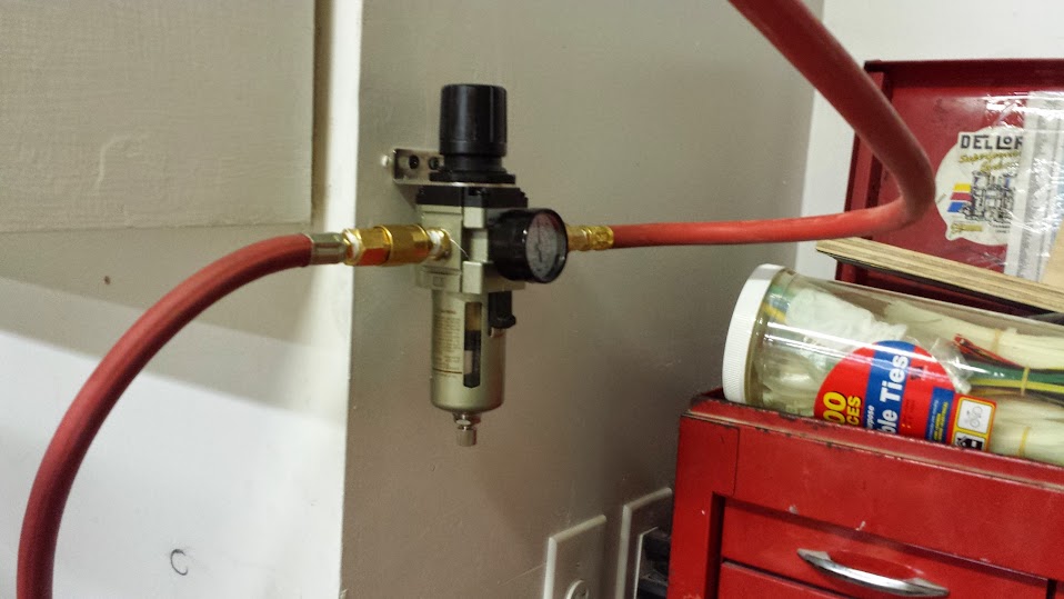 Another approach to hanging a hose reel. - The SawdustZone