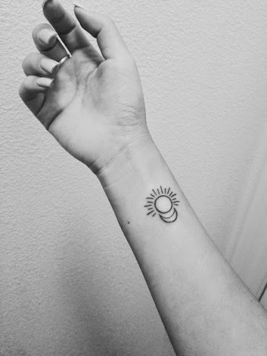 Sun and Moon Tattoos on the wrist