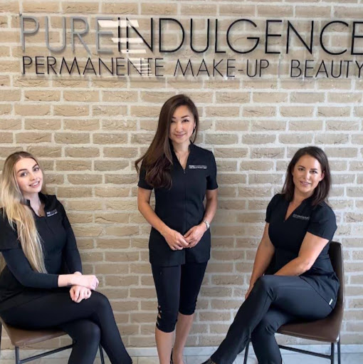 Pure Indulgence Beauty Studio logo