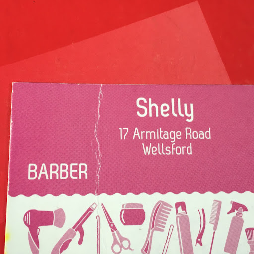 Shelly’s barber shop logo