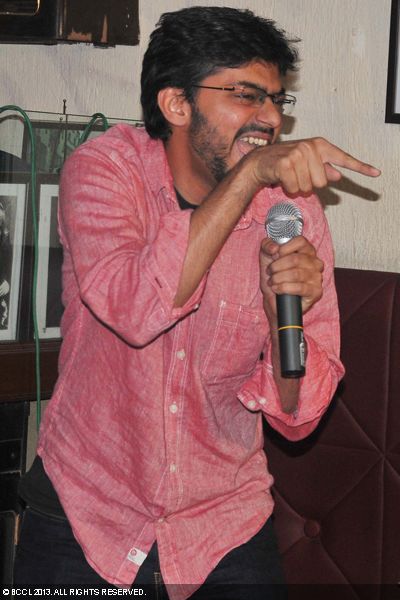 Kunal Rao cracks a joke during a comedy gig at Cafe Morrison, New Delhi.