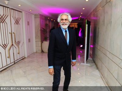 Sunil Sethi strikes a pose during the Times of India Social Impact Awards, held in Delhi. 