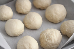 photo of the dough balls in a baking pan