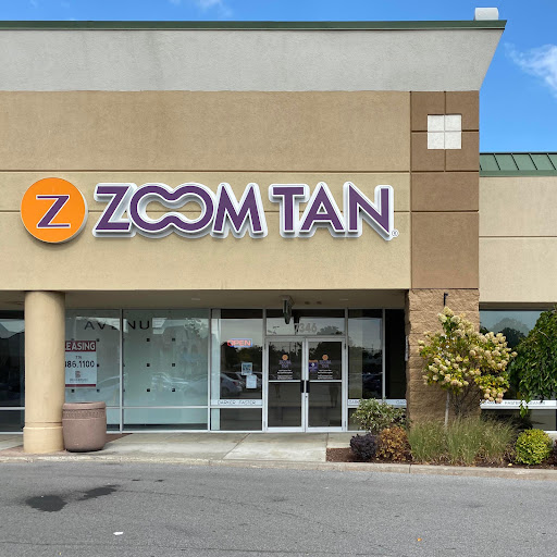 Zoom Tan logo