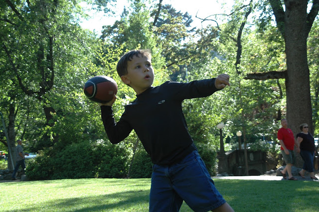 Image of Kreshel throwing football