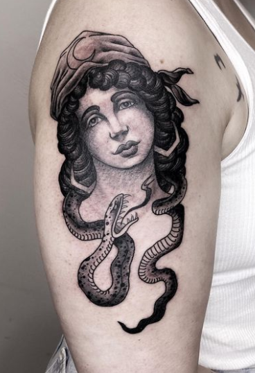 Girl With Snake Tattoo On Shoulder