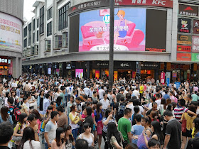 dense crowd at Dongmen in Shenzhen during Labour Day